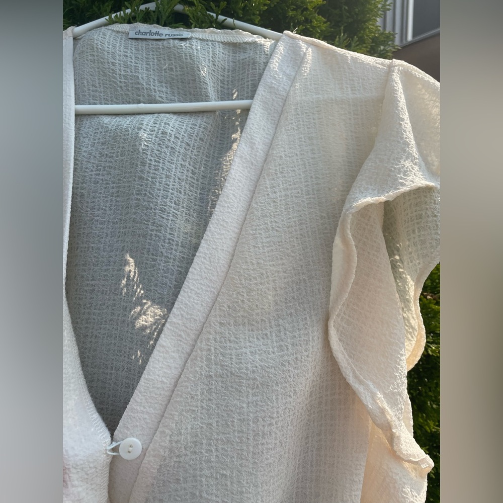 Flowy short sleeve sheer top!